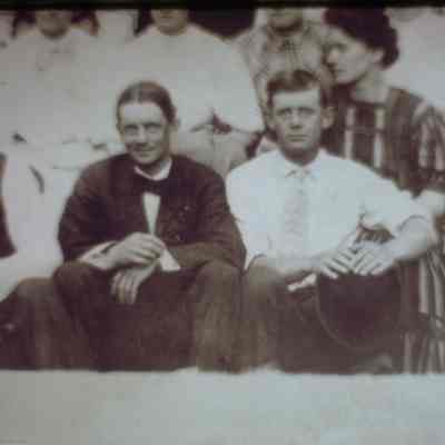 John P. (middle) and Raymond L. (right) Peterson. Younger sons of P.N. Peterson, Amherst, Wisconsin