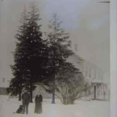 Martin and Hanna Wrolstad near their farmhouse at Peru, town of New Hope, Portage County, WI. Taken around 1910