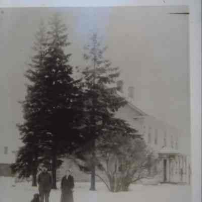 Martin and Hanna Wrolstad near their farmhouse at Peru, town of New Hope, Portage County, WI. Taken around 1910