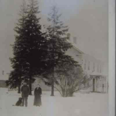 Martin and Hanna Wrolstad near their farmhouse at Peru, town of New Hope, Portage County, WI. Taken around 1910