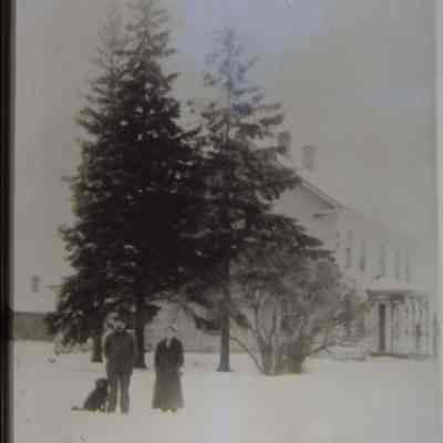 Martin and Hanna Wrolstad near their farmhouse at Peru, town of New Hope, Portage County, WI. Taken around 1910