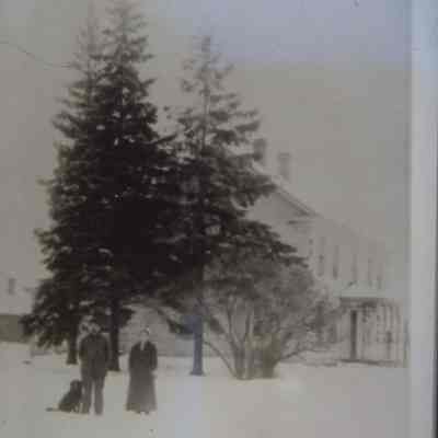 Martin and Hanna Wrolstad near their farmhouse at Peru, town of New Hope, Portage County, WI. Taken around 1910