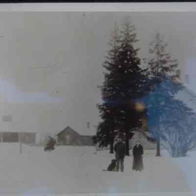 Martin and Hannah Wrolstad on their farm, northeast edge of Peru, village intersection of county highways T and Z, town of New Hope, Portage County, WI. taken around 1910.