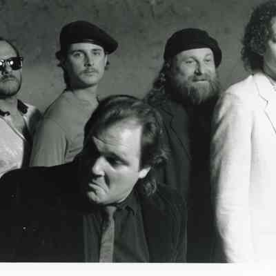 L-R, Jim Meyers (tenor sax), Stuart McDoniel (drums), Tony Menzer (bass), Ken Bohannon (guitar), Otis McLennon (harmonica, vocals. in front)