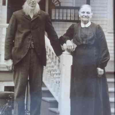 Lewis and Ingeborg Groe Nelson, in front of their house, 206 Wilson Street, Amherst, WI