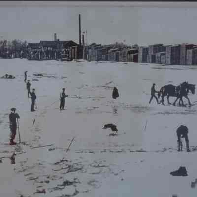 John Week Lumber Company, east side of Wisconsin River, circa 1910, Stevens Point, WI. Ice cutters in foreground.