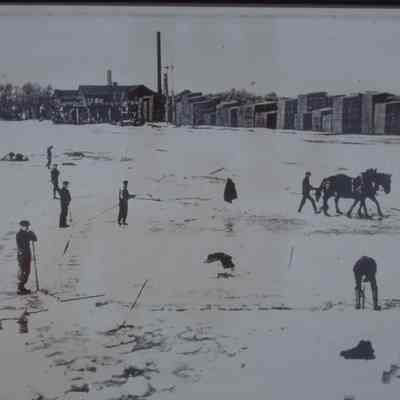 John Week Lumber Company, east side of Wisconsin River, circa 1910, Stevens Point, WI. Ice cutters in foreground.