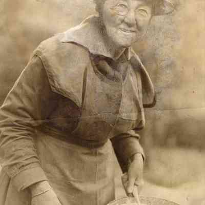 Photo of Minnie Burdick wearing uniform and WWI helmet: Copyright: Salvation Army Central Territory Historical Museum; Origformat: Print-Photographic