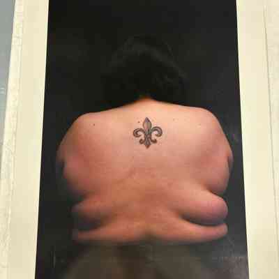 Untitled (Fleur-de-lis Back Tattoo)