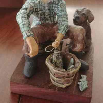 "Fisherman with Dog"