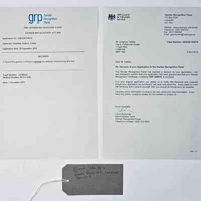 Two A4 pages of an approval letter from the Gender Recognition Panel, confirming their decision to grant a Gender Recognition Certificate. With a brown, handwritten luggage tag.