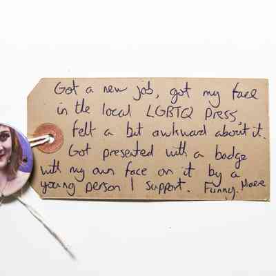 Badge Of Womans Face On Purple Background.