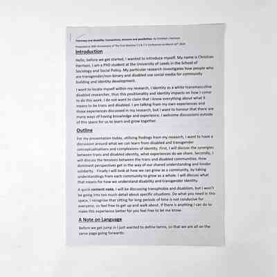 A stapled set of white A4 pages with the words of a speech on Transness and Disability in black typed text.