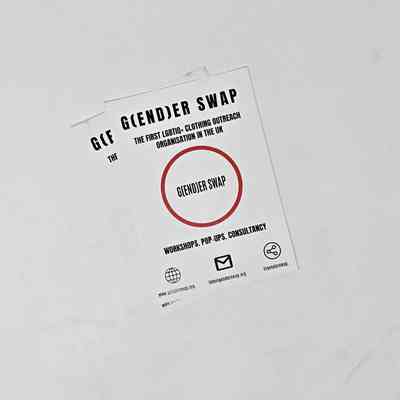 White flyer reading "G(END)ER SWAP THE FIRST LGBTIQ+ CLOTHING OUTREACH ORGANISATION IN THE UK"