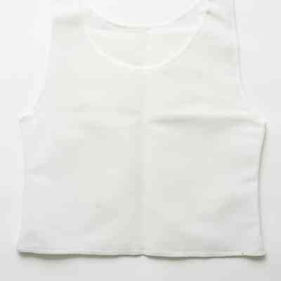 A white binder lay on a white background.