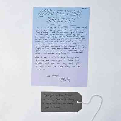 A handwritten birthday letter from Caspian to Raleigh. With an brown, handwritten luggage tag.