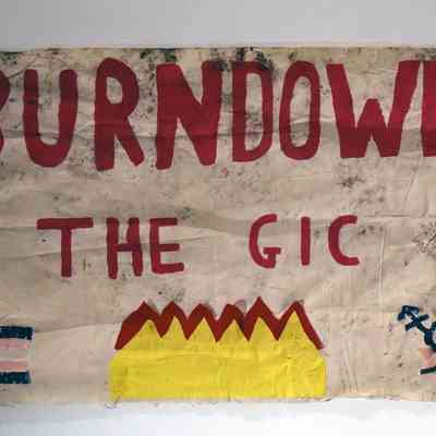 "Burn Down the GIC" cloth banner.
