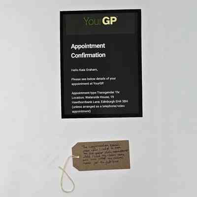 Photograph of an appointment confirmation message from YourGP. With a brown handwritten luggage tag.