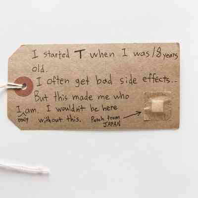 The tag shares a personal story about starting T at 18 and has a testosterone patch stuck onto it.