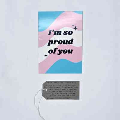 The image shows a colorful card stating "I'm so proud of you," above a heartfelt note.