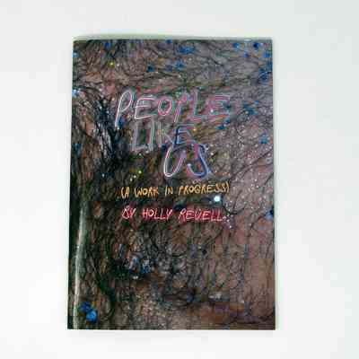 The book cover features colourful, handwritten text which says 'People Like Us: A Work In Progress By Holly Revell' on a background photograph of a hairy chest which is sparkling with gems and glitter.
