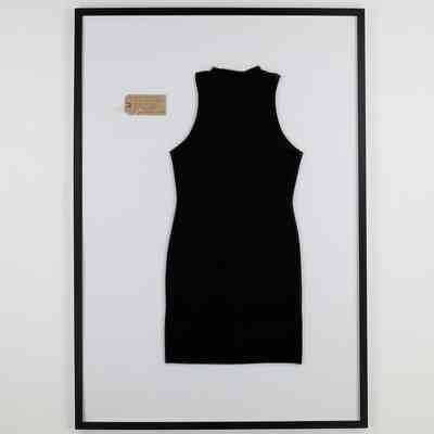 Black sleeveless dress with grey stripes in a frame with a brown tag within the frame in the top left.