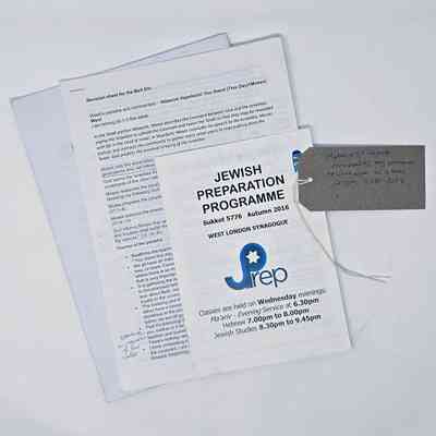 Documents relating to religious conversion to Judaism. With a brow, handwritten luggage tag.