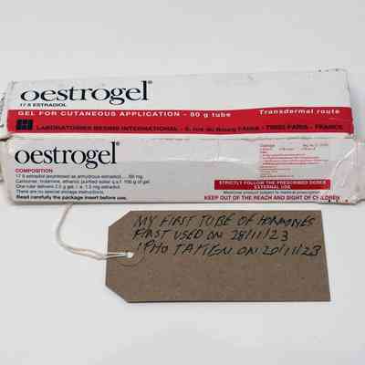 Box of Oestrogel with handwritten brown luggage tab.