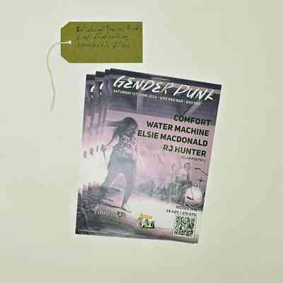 Four copies of a flyer advertising Gender Punk fundraising concert. It lists the performers and the background image is of a person playing drums and another person holding a microphone and headbanging. With a brown, handwritten luggage tag.