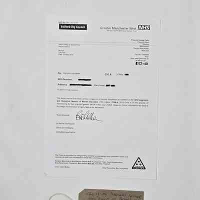 The image shows a diagnosis letter from Greater Manchester West NHS, with a handwritten note below.