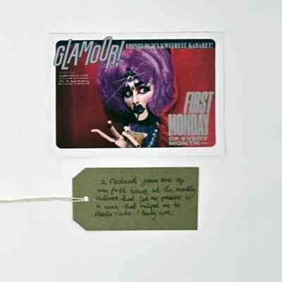 Postcard from Glamour, Edinburgh's Queerest Kabaret. With a brown handwritten luggage tag.