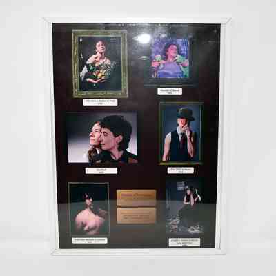 The framed collection showcases six photographs with titles, arranged against a dark background.