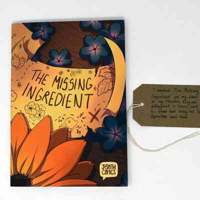 The image shows a comic book titled "The Missing Ingredient" with vibrant illustrations and a handwritten note.