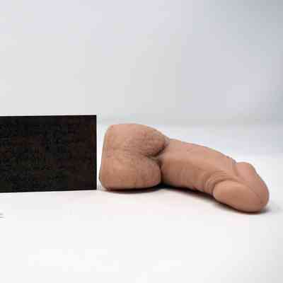 A packer with a brown label tag.