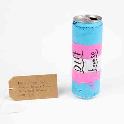 A colorful can painted in blue, pink, and white with handwritten labels on it.