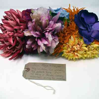 Bra made of various pink, purple, and yellow flowers.