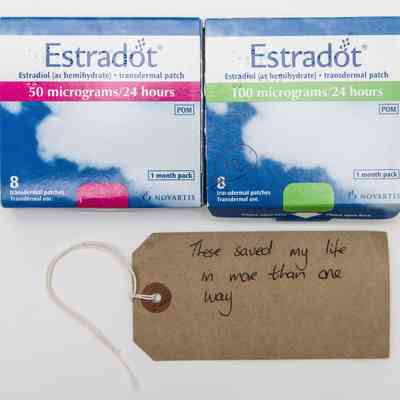 One blue box with greens stripe reading "Estradot 100 micrograms/ 24 hours" and one blue box with pink stripe reading "Estradot 50 micrograms/24 hours"