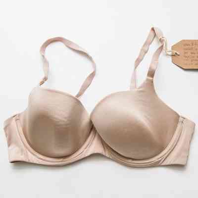 Tan bra with a tag on the left strap.