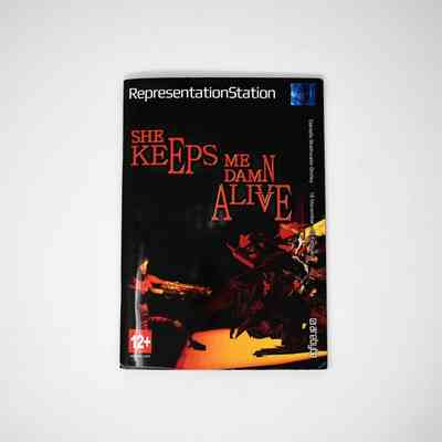 Black booklet reading "RepresentationStation" at the top with red letters reading "SHE KEEPS ME DAMN ALIVE" in jagged font underneath.