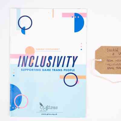 The image shows a booklet titled "Inclusivity," supporting BAME trans people, with a tag.