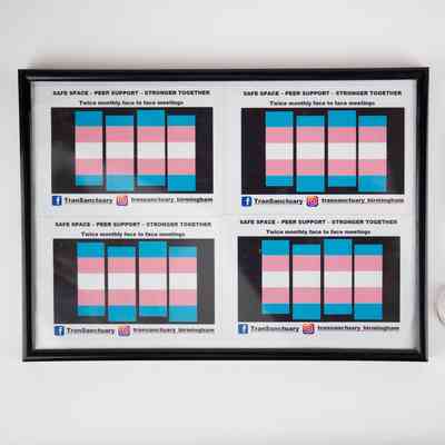 Four copies of TranSanctuary flyer drafts in a black frame, next to the associated polaroid and tag.