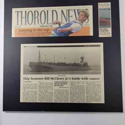 Plaque of 2002 newspaper clippings