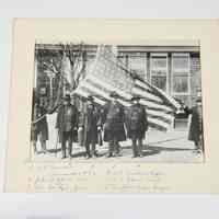 Veterans Posing with the American Flag in Front of Public School 24