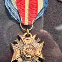          Veterans of Foreign Wars; A detailed view of a medal with the inscription 
