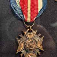          Veterans of Foreign Wars; A detailed view of a medal with the inscription 