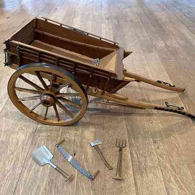 Model of horsedrawn cart with tools