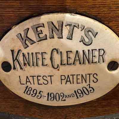 Enamel label of maker's name and dates of patents for the Kent's Knife Cleaner