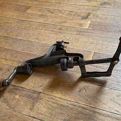 Cartridge refiller showing clamps for cartridge
