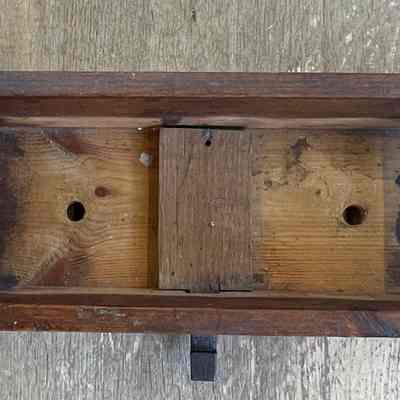Interior bottom of deadfall mousetrap