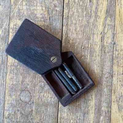 Small box with firing pins for 12 bore gun